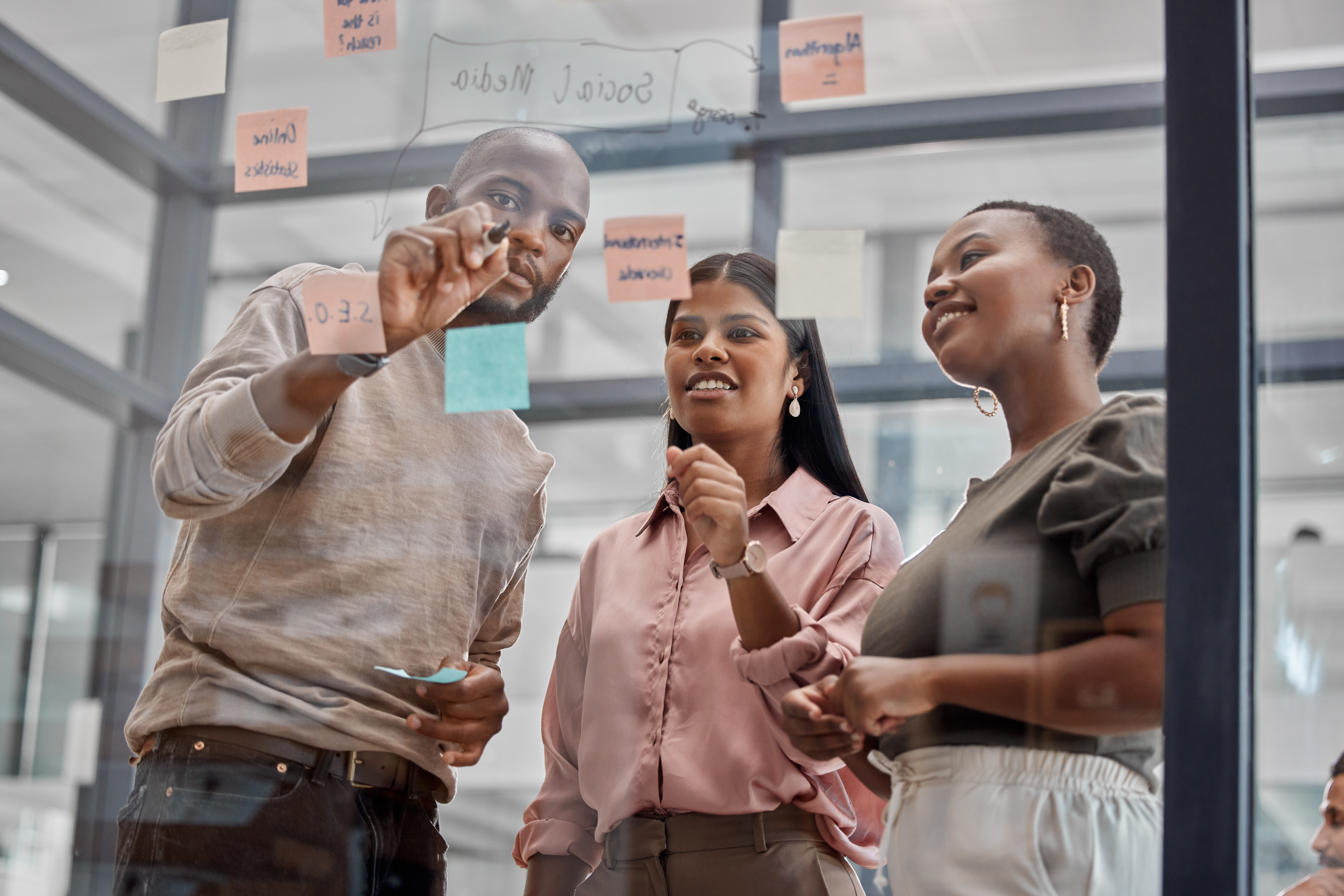Team collaborating on a business plan in the workplace