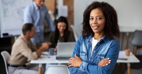 close-up-smiling-person-conference-room_23-2149085989